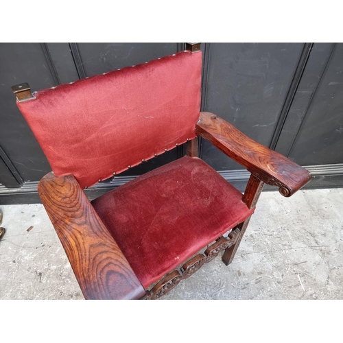 1074 - An unusual antique carved walnut throne type chair.