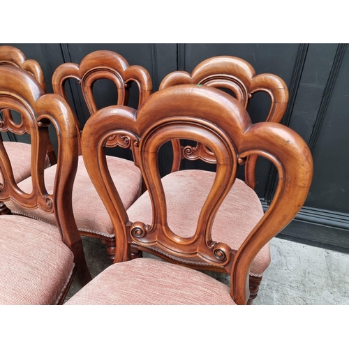 1083 - A set of six Victorian mahogany dining chairs. (6)