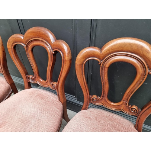 1083 - A set of six Victorian mahogany dining chairs. (6)