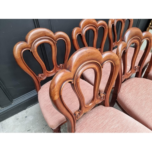 1083 - A set of six Victorian mahogany dining chairs. (6)