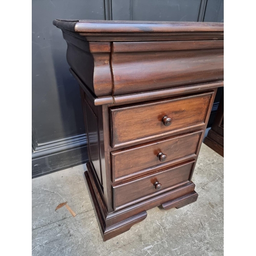 1107 - A reproduction stained hardwood pedestal desk, 152cm wide.