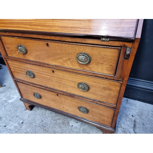 1121 - A small early 20th century satinwood bureau, 73.5cm wide.