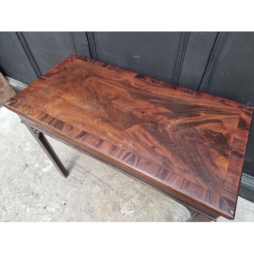 1123 - A George III mahogany rectangular concertina card table, 90.5cm wide, (alterations).... 