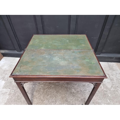 1123 - A George III mahogany rectangular concertina card table, 90.5cm wide, (alterations).... 