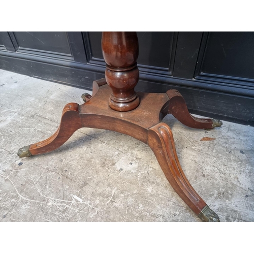 1124 - A George IV mahogany pedestal card table, 91.5cm wide.