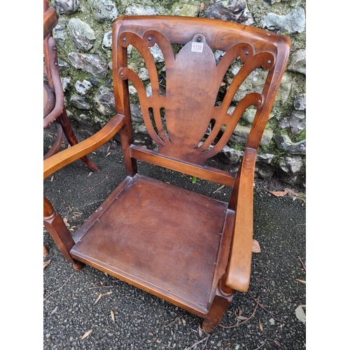 1135 - An antique beech elbow chair; together with a 1930s walnut low occasional chair. (2)... 