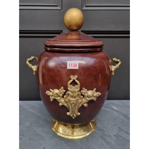 1138 - A turned wood and brass mounted twin handled jar and cover, 46cm high.