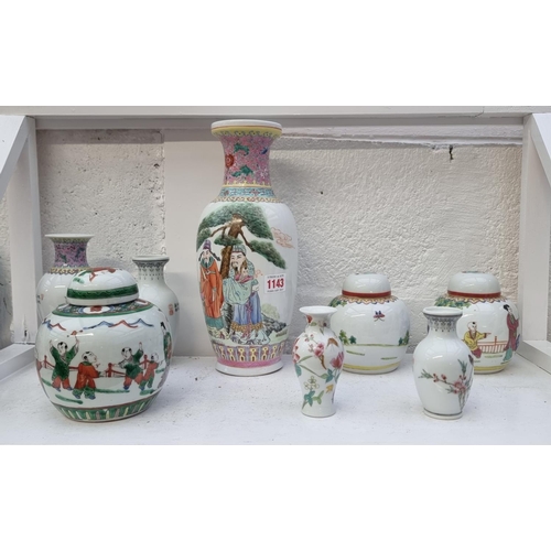 1143 - Seven Chinese famille rose vases and jars, largest 31cm high; together with another famille verte ja... 