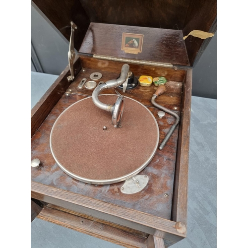 1173 - A 1920s HMV oak table top gramophone.