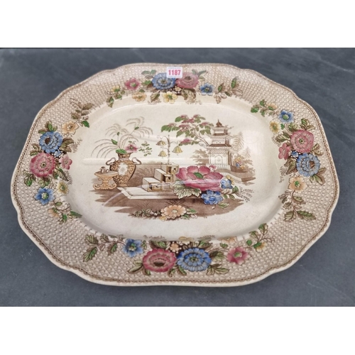 1187 - A Victorian pottery 'Tree and Well' meat plate, 49cm wide.