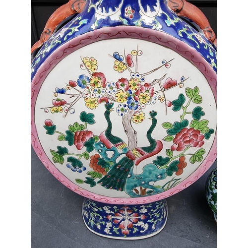 1190 - A large Chinese famille rose twin handled moon flask, 47cm high, (hairline cracks); together wi... 