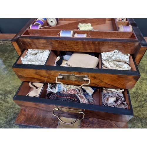 1196 - A late Victorian figured walnut work box, 34cm wide.