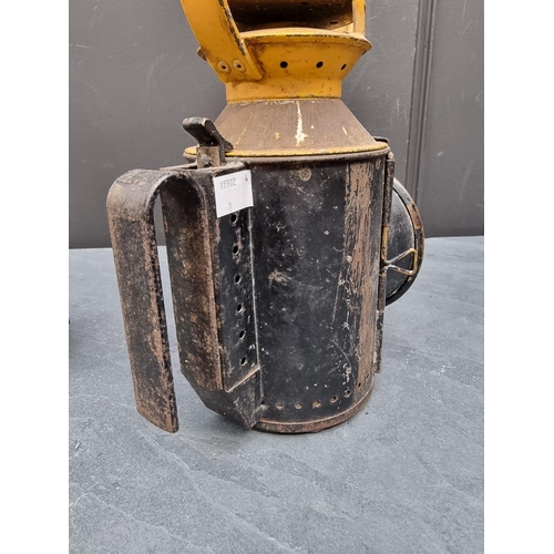 1197 - Railwayana: a BR(M) lantern; and another smaller lantern. (2)