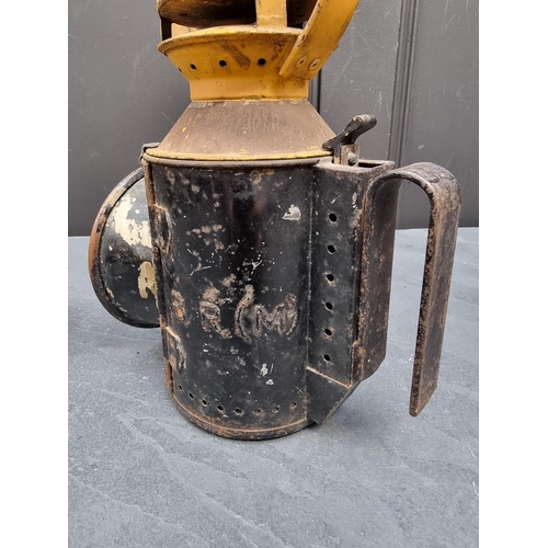 1197 - Railwayana: a BR(M) lantern; and another smaller lantern. (2)