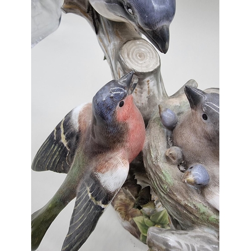 1244 - A large Meissen figure group of three birds, 35.5cm high, (some restoration).