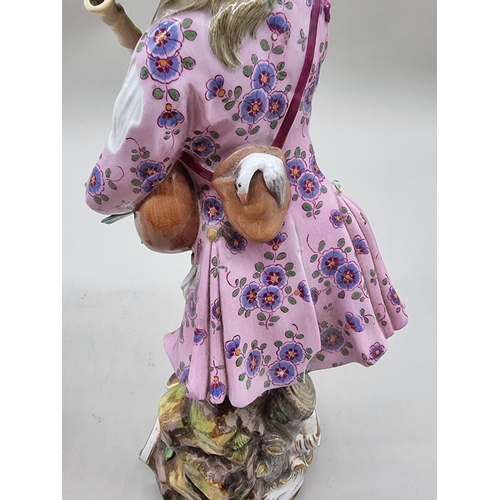 1245 - A large pair of Meissen porcelain figures of musicians, largest 33cm high.... 