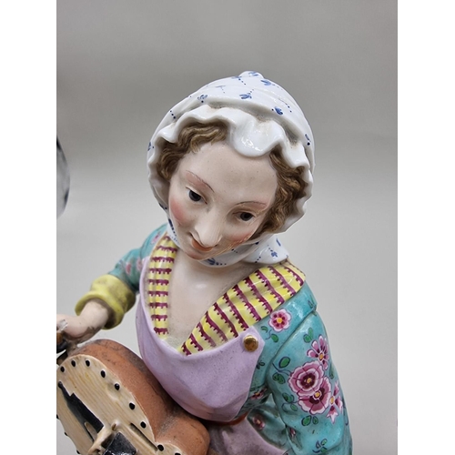 1245 - A large pair of Meissen porcelain figures of musicians, largest 33cm high.... 