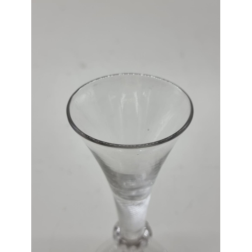 1251 - An antique airtwist wine glass, 16cm high.