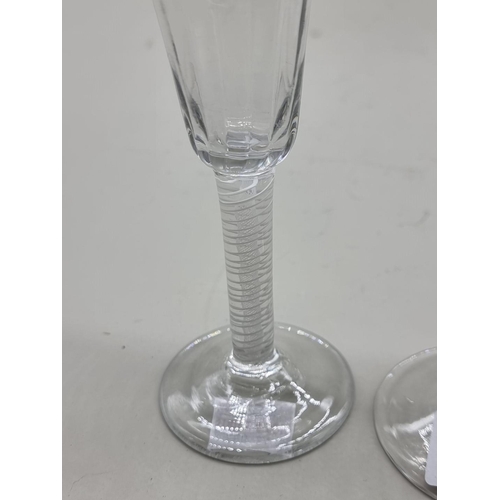 1255 - An antique airtwist wine glass, 16.5cm high; together with an opaque twist ale glass, 16.5cm hi... 