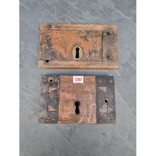 1297 - Two large antique oak and steel door locks. (2)