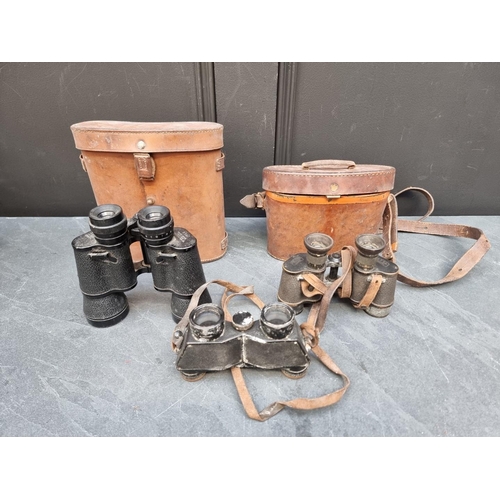 1301 - Three vintage pairs of binoculars, to include: a Zeiss pair. (3)