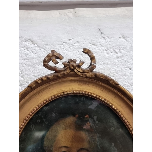 1318 - An antique reverse glass portrait of a lady, 19.5 x 14.5cm oval.