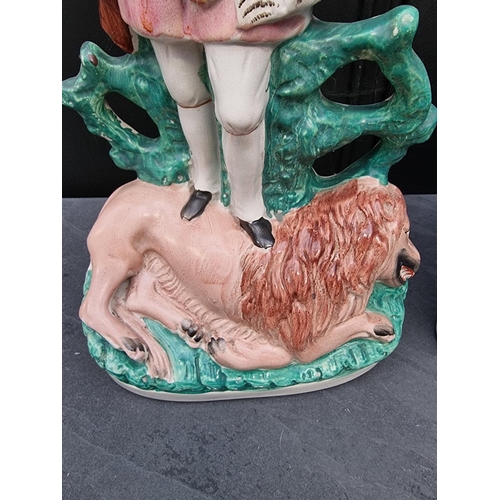 1388 - Two large Victorian Staffordshire pottery figures, of 'Dick Whittington' and 'Lion hunter', latter 3... 