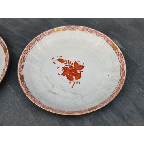 1414 - A large pair of Herend cups and saucers, the saucers 21.5cm diameter. 