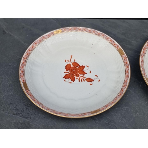 1414 - A large pair of Herend cups and saucers, the saucers 21.5cm diameter. 