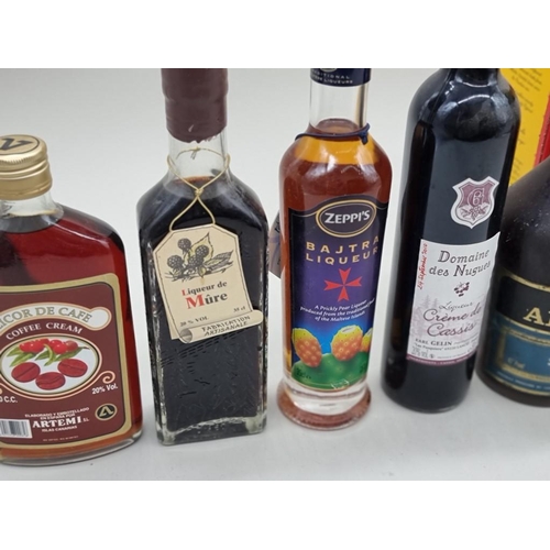 124 - Eight bottles of Liqueur and similar, to include a 1 litre Bols Cherry Brandy; and a 24 fl.oz. Sloe ... 