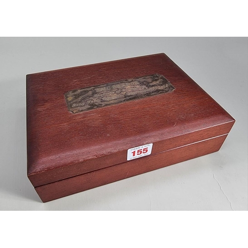 155 - A mahogany humidor, with presentation plaque to hinged top, 25.5cm wide; together with two cigar cut... 