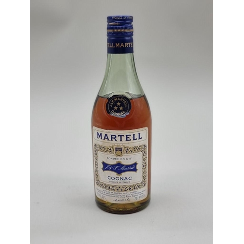 31 - An old 12 fl.oz. bottle of Martell 'Three Star' Cognac, probably 1970s bottling.