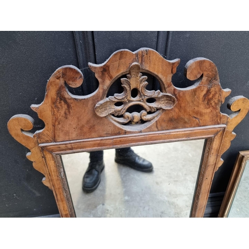 1137 - A Georgian walnut and parcel gilt fret framed wall mirror, 71 x 43cm; together with another mirror. ... 