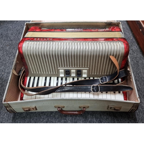 1334 - A Hohner 'Carena IIM' piano accordion, in case.