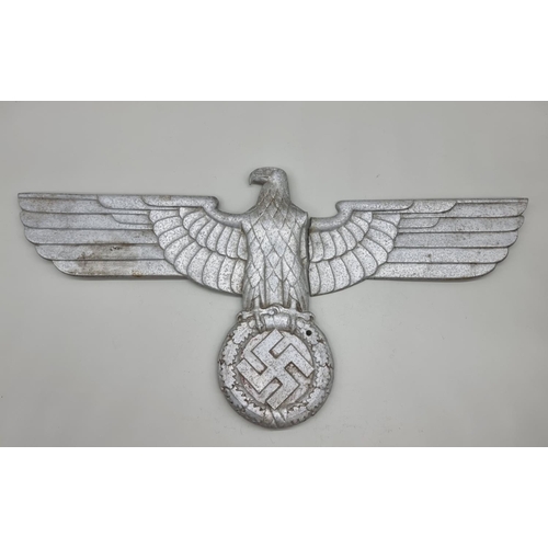 1512 - A German Third Reich aluminium State Eagle Hoheitszeichen, 68.5cm wide. (a.f.).Provenance: by repute... 