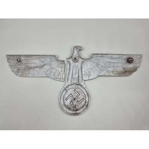 1512 - A German Third Reich aluminium State Eagle Hoheitszeichen, 68.5cm wide. (a.f.).Provenance: by repute... 