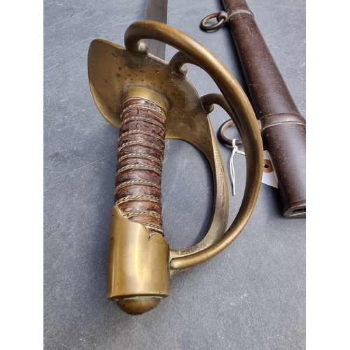 1540 - A Napoleonic French Heavy Cavalry Cuirassier sword and scabbard, the 95cm blade marked 'AP' for Atel... 