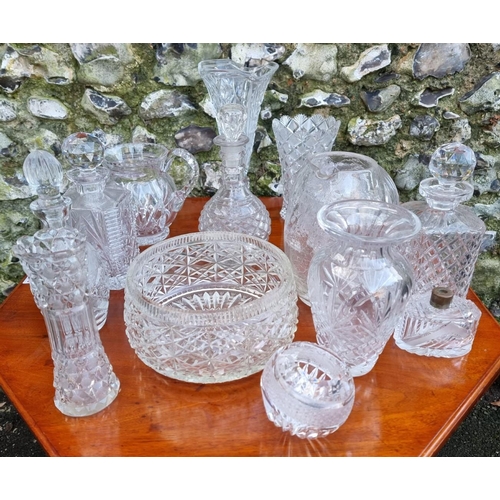 1566 - A collection of decanters and other glassware. 