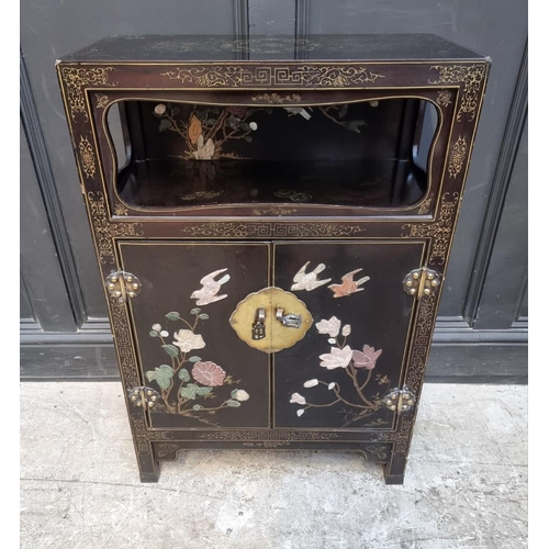 1001 - A modern Chinese black lacquered and soapstone side cabinet, 61cm wide.