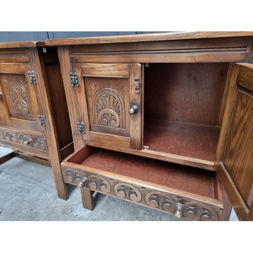 1004 - A pair of 'Bevan Funnell' oak side cabinets, 68.5cm wide. (2)