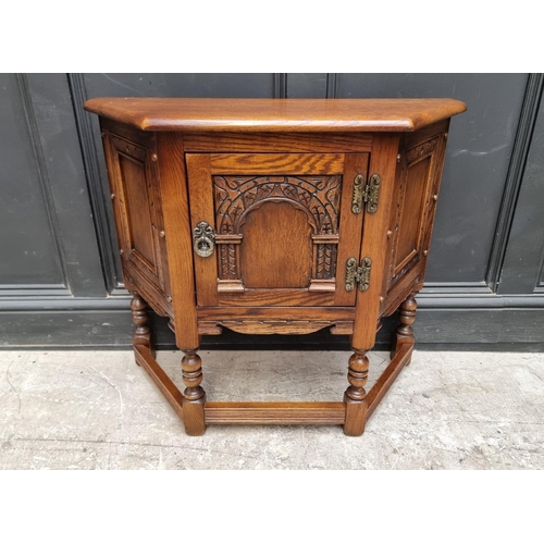 1008 - An 'Old Charm' oak credance cupboard, 81cm wide.