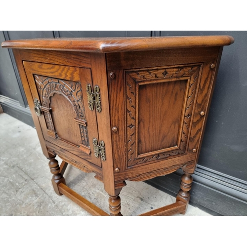 1008 - An 'Old Charm' oak credance cupboard, 81cm wide.