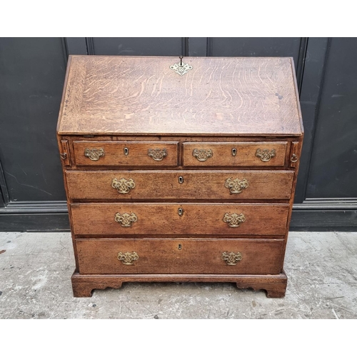 1013 - An 18th century oak bureau, 91.5cm wide.