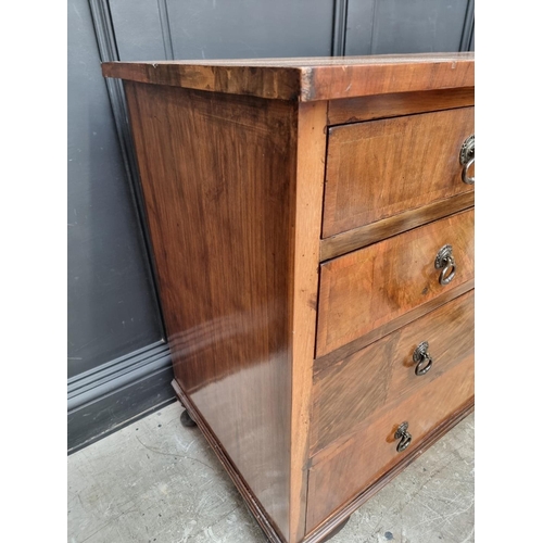 1017 - A 1930s walnut chest of drawers, 106.5cm wide.