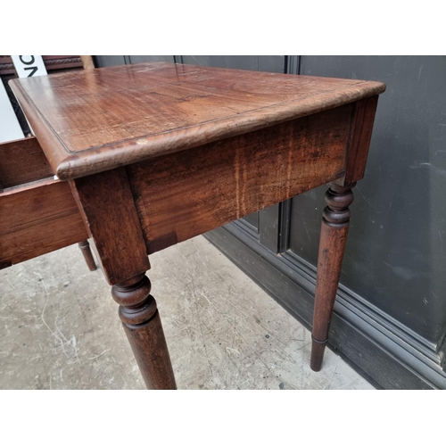 1021 - A Victorian mahogany side table, with a pair of frieze drawers flanking a dummy drawer, 90.5cm ... 