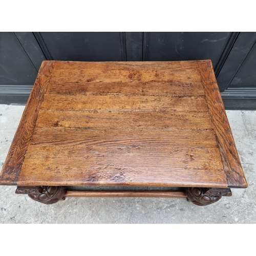 1024 - A good reproduction oak low occasional table, 97.5cm wide.