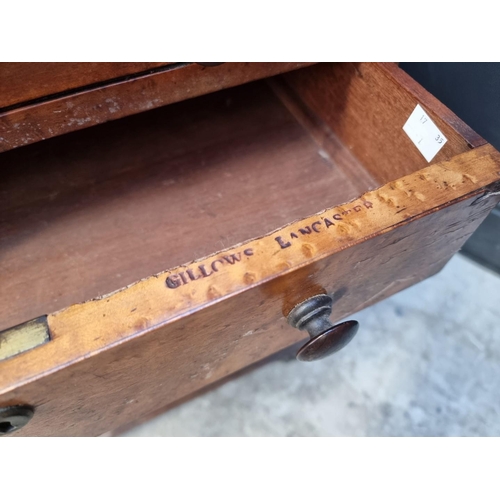 1039 - An early 19th century birds' eye maple Davenport, stamped 'Gillows Lancaster', 61cm wide.... 