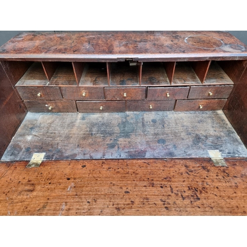 1041 - An 18th century oak bureau, 92cm wide.