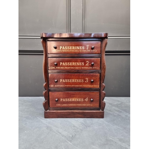 1060 - An oak collector's chest, the four drawers each with gilt inscription, the back labelled 'Natural Hi... 