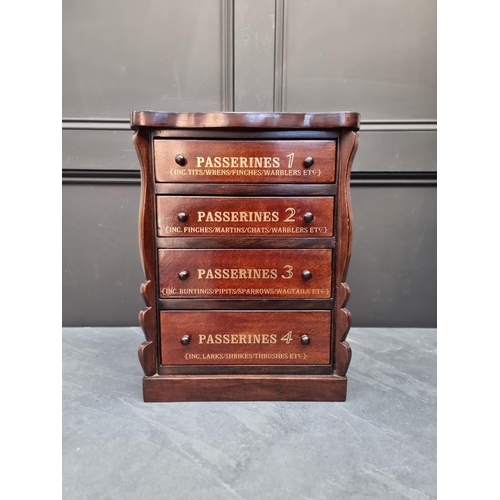 1060 - An oak collector's chest, the four drawers each with gilt inscription, the back labelled 'Natural Hi... 